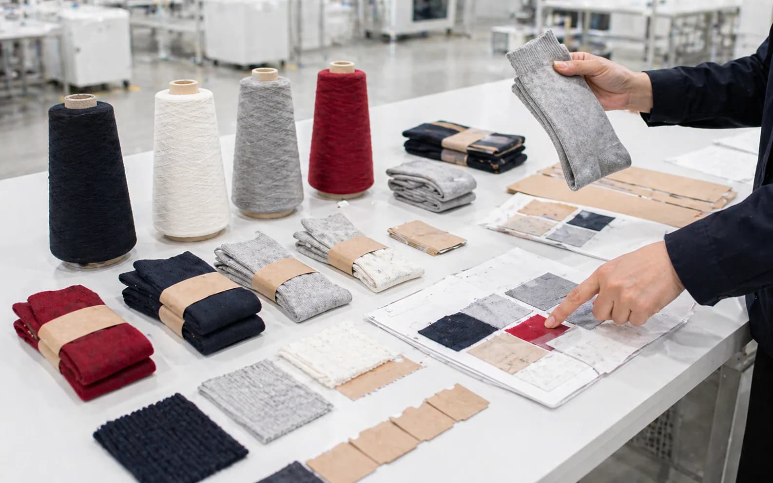 Socks, materials, and packaging references arranged for a commercial review