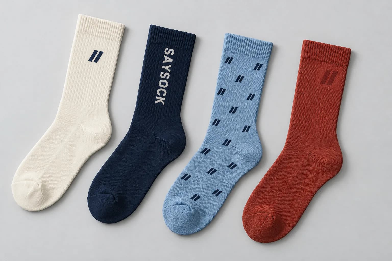 Illustrative sock concepts with a small logo, wordmark, repeat pattern and tonal mark